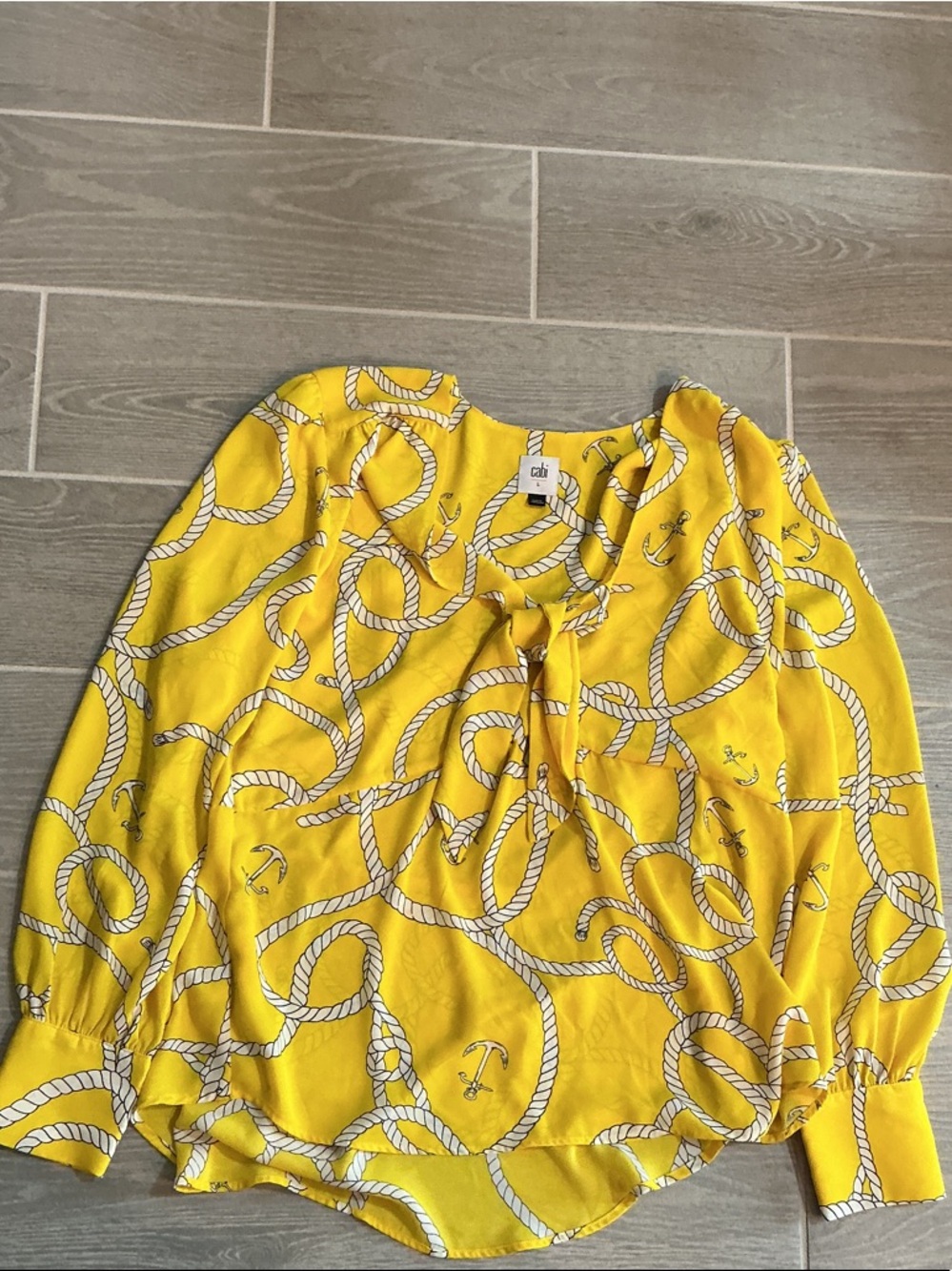 CAbi Yellow Rope & Anchor Tie-Neck Blouse Women’sll Sz Large 
100% polyester